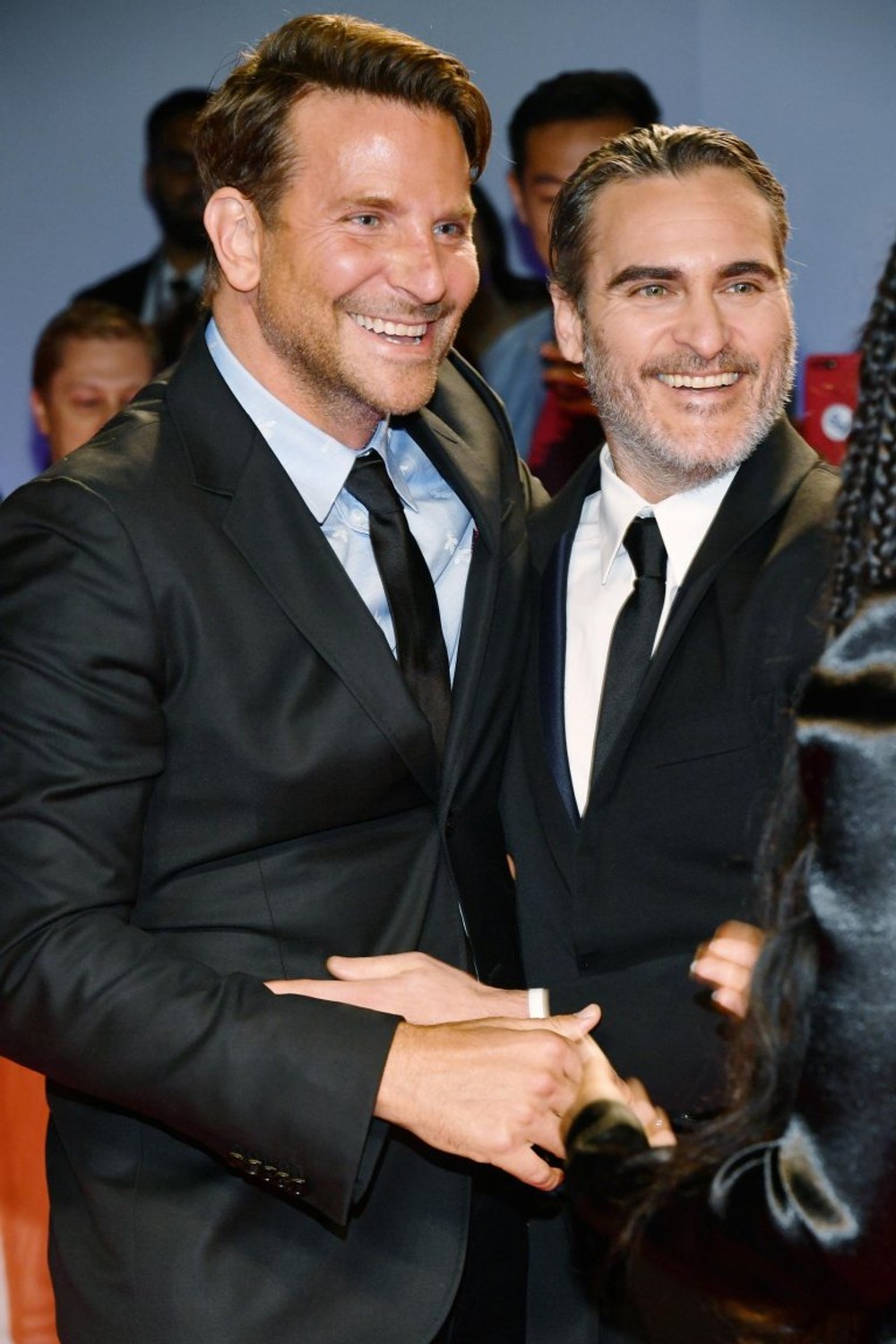 Bradley Cooper a Joaquin Phoenix