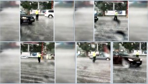 Policajt v akcii. Počas búrky riadil dopravu na Bajkalskej ulici