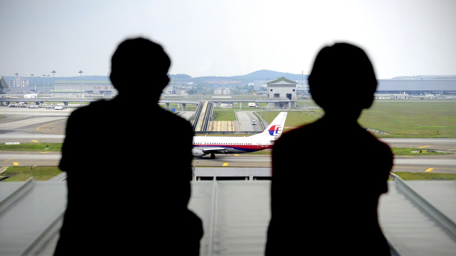 malajzijské lietadlo, ľudia v tieni ilustračná foto