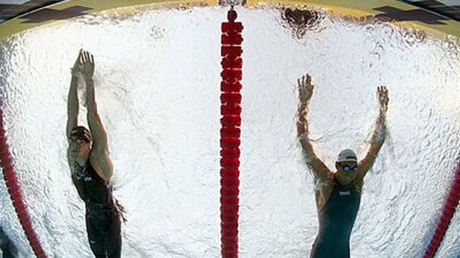 plavci Phelps a Cavic spod vody