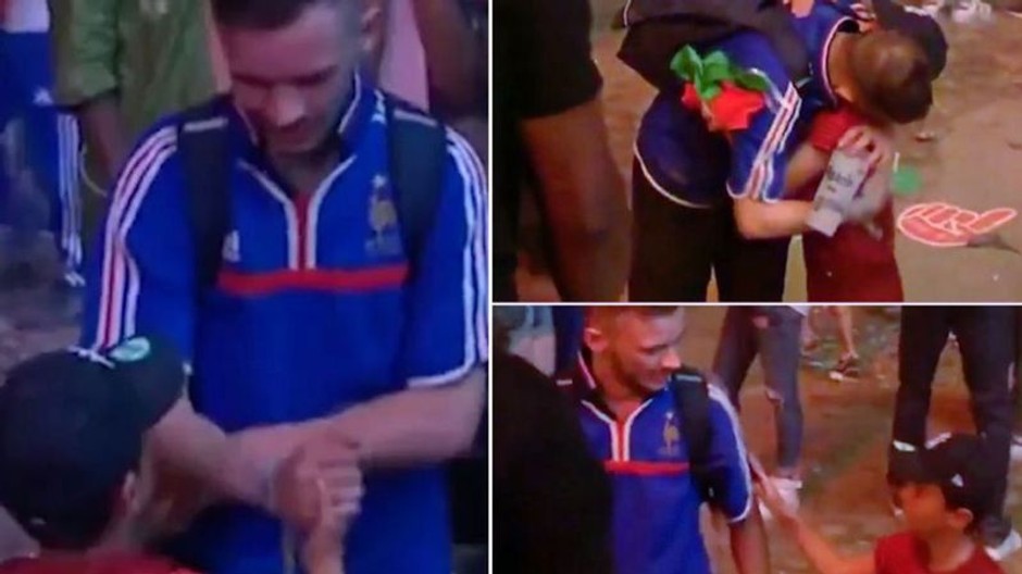 Young Portugal supporter consoles